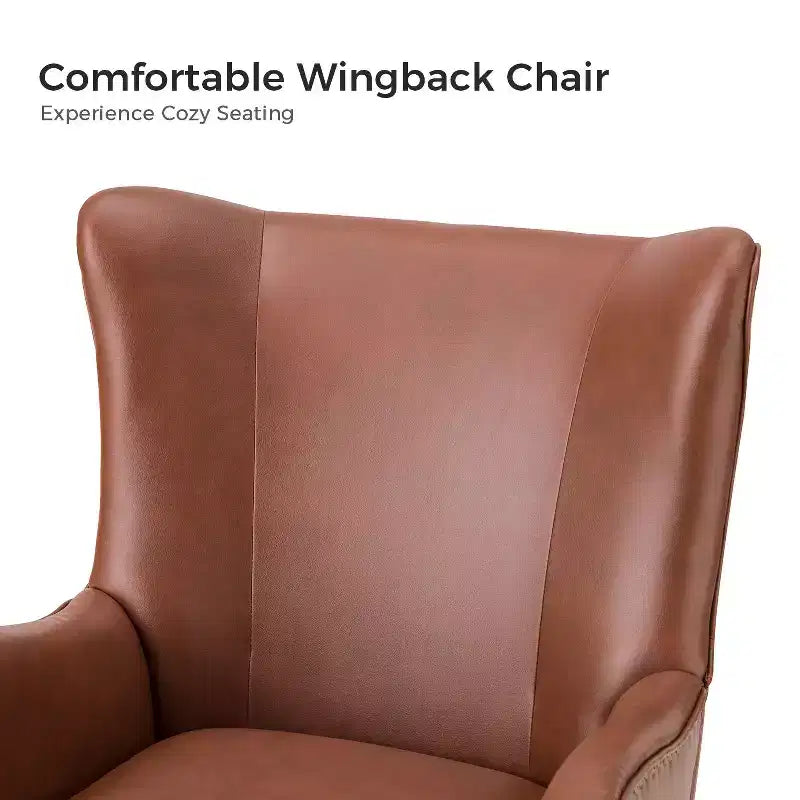 Fauteuil classique avec dossier à oreilles et clous décoratifs