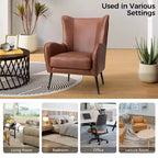 Fauteuil classique avec dossier à oreilles et clous décoratifs