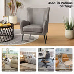 Fauteuil classique avec dossier à oreilles et clous décoratifs