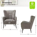 Fauteuil classique avec dossier à oreilles et clous décoratifs