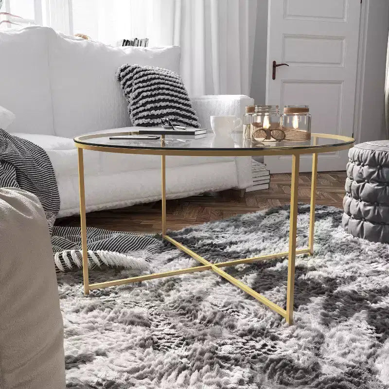 Table basse de salon en verre avec piètement en métal entrecroisé